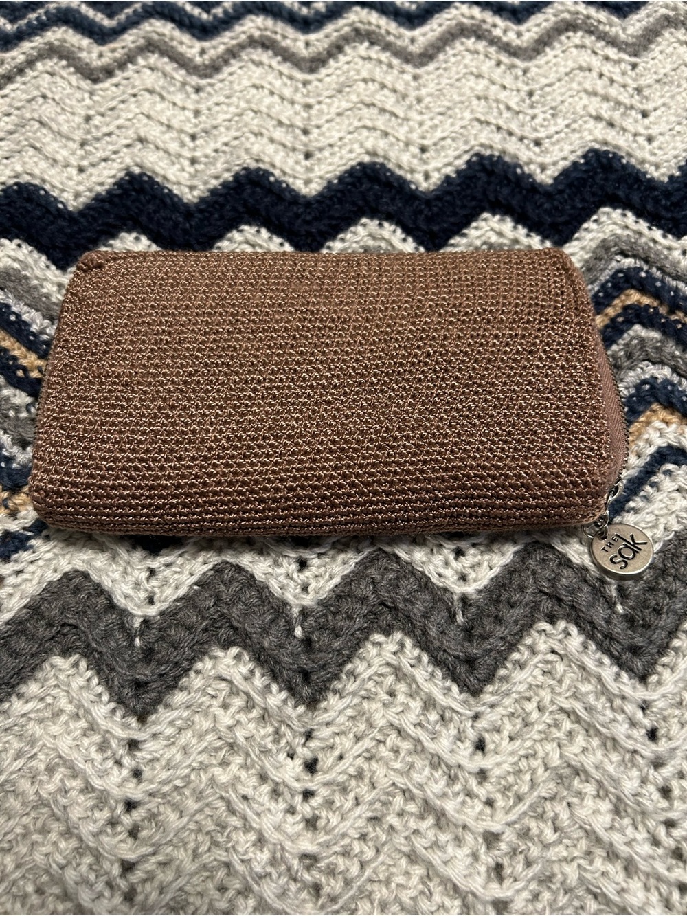 The Sak Brown Woven Zip Wallet with Logo Pull
